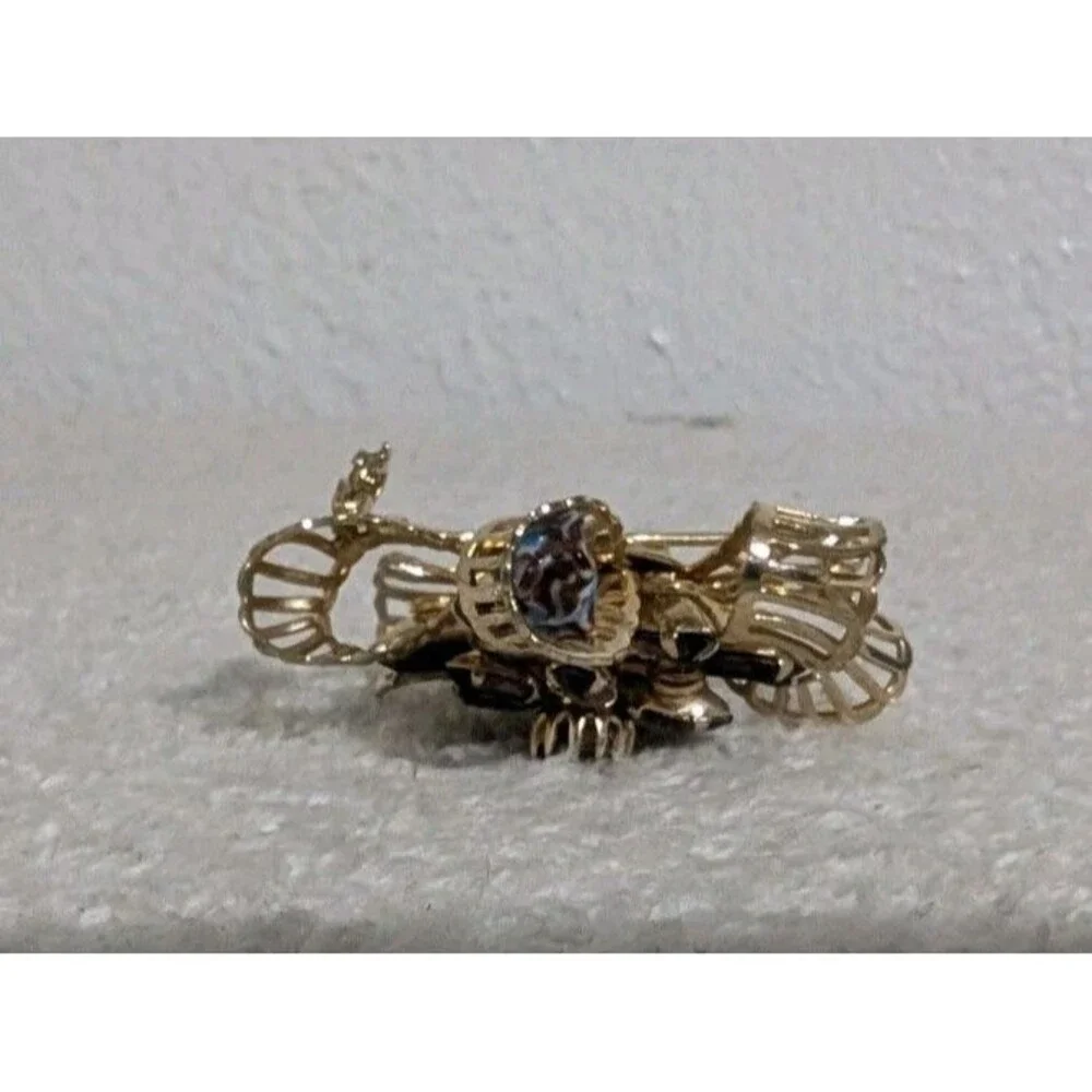 Purple Rhinestone Gold Tone Floral Brooch Signed KRAMER OF NEW YORK Vintage Pin